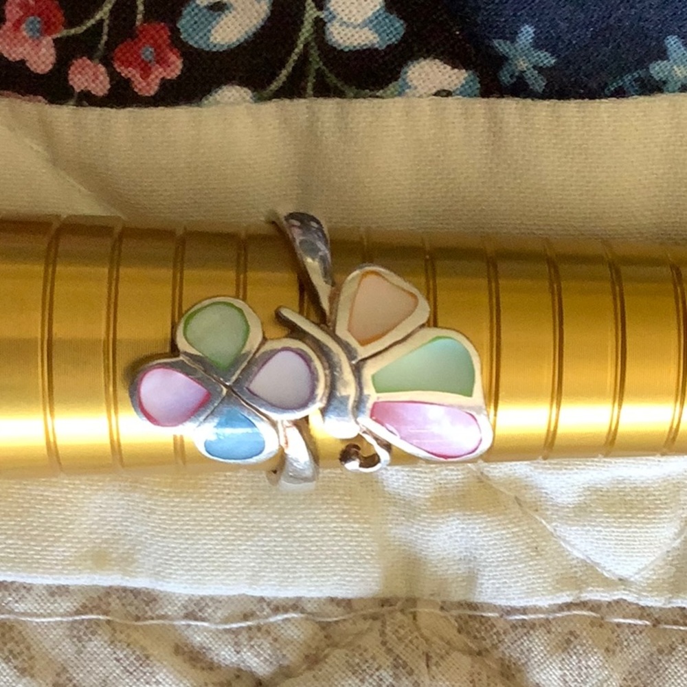 Colourful butterfly and flower ring
